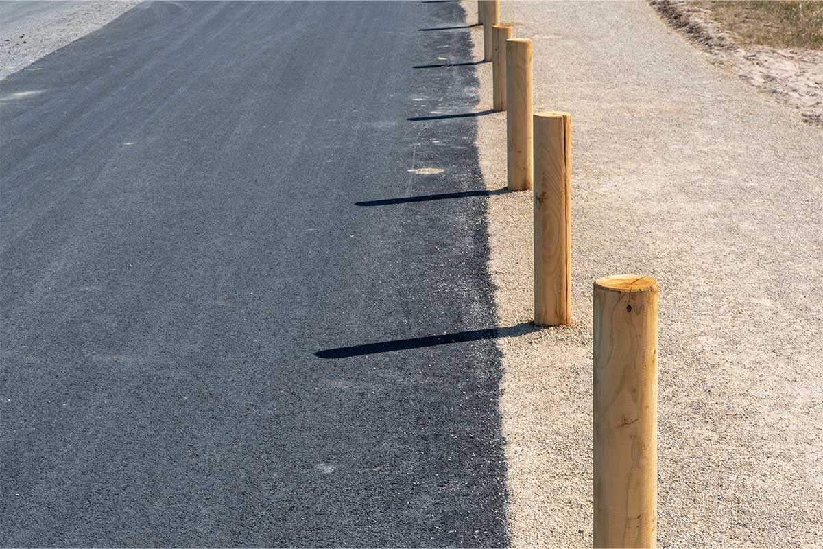 can asphalt be laid over concrete driveway